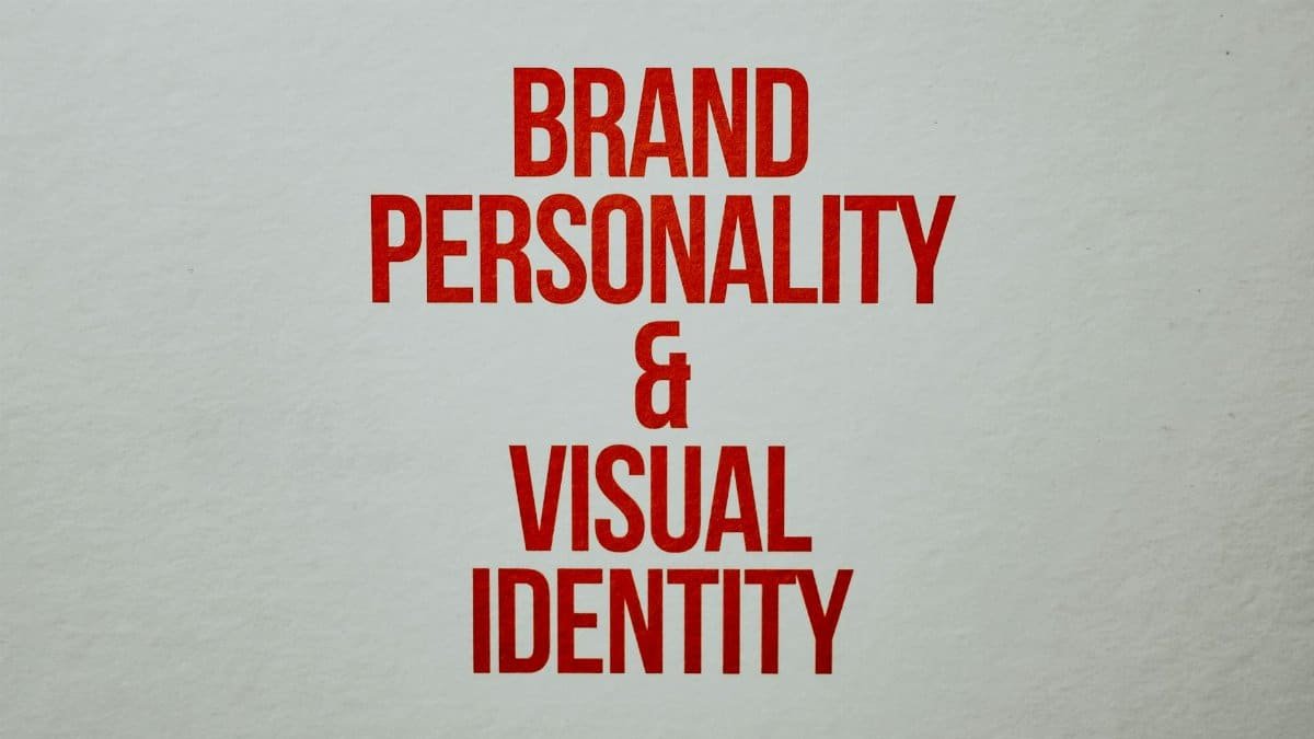 Red text emphasizing brand personality and visual identity on a neutral background.