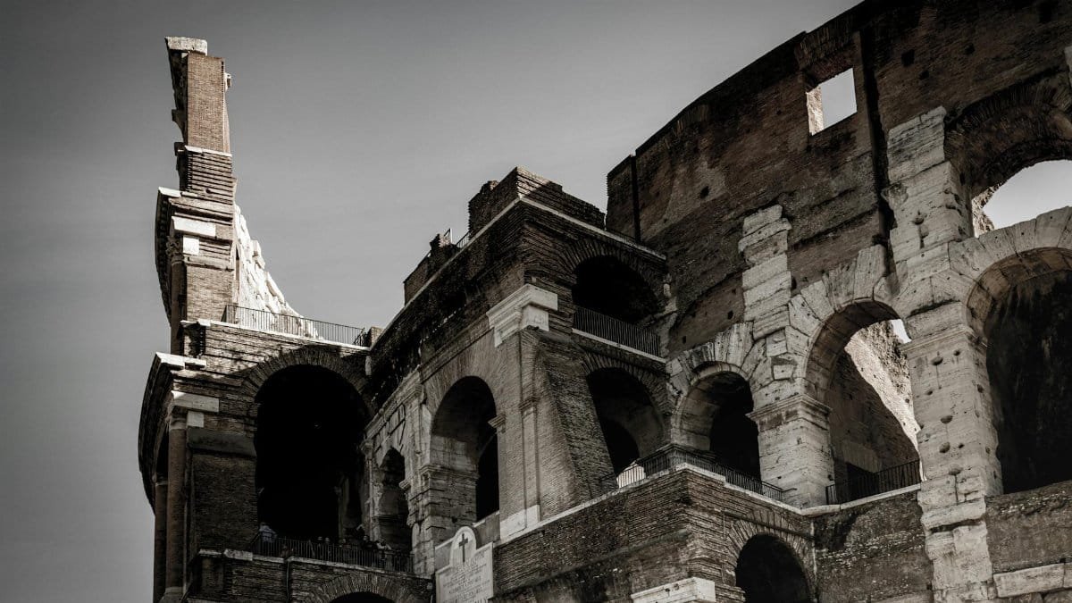 Detailed view of the historic Colosseum showcasing ancient Roman architecture.