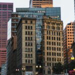 Bustling street scene in downtown Boston, showcasing modern and classic architecture.