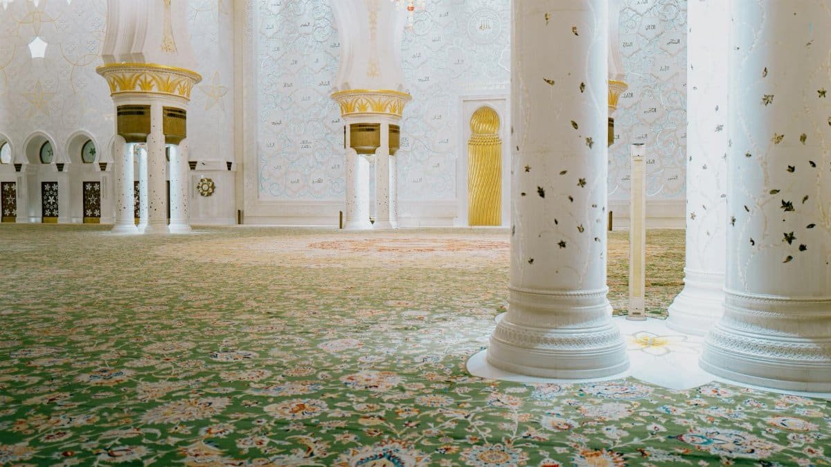 Explore the intricate design of the Sheikh Zayed Grand Mosque's prayer hall in Abu Dhabi.