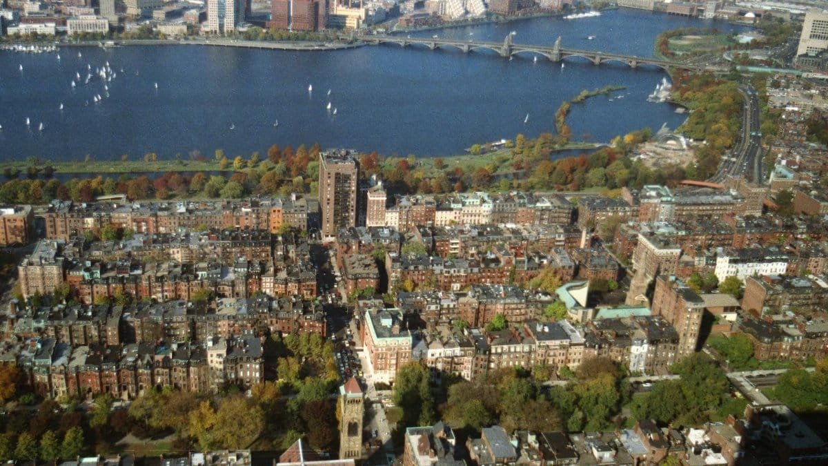 Stunning aerial shot of Boston skyline and Charles River in fall.