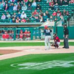 A thrilling baseball game at Victory Field, Indianapolis with players and crowd engaged.