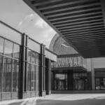 Modern architectural design of Grand Majidi Mall in black and white. Urban exterior facade.