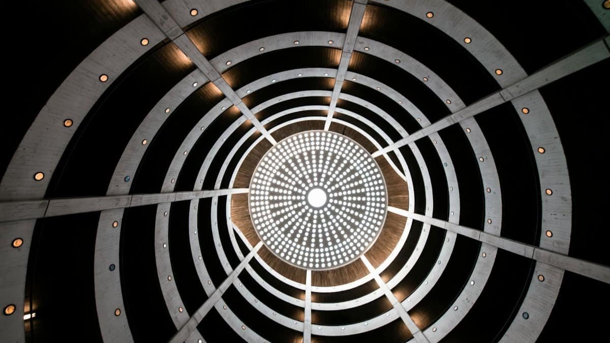 A stunning spiral staircase in Hamburg offers a mesmerizing architectural view from below.