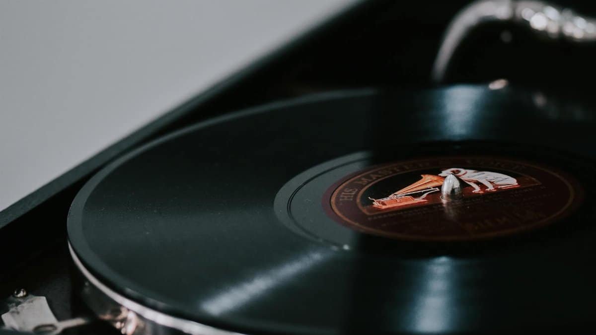 A close-up look at a vintage vinyl record spinning on a classic turntable.