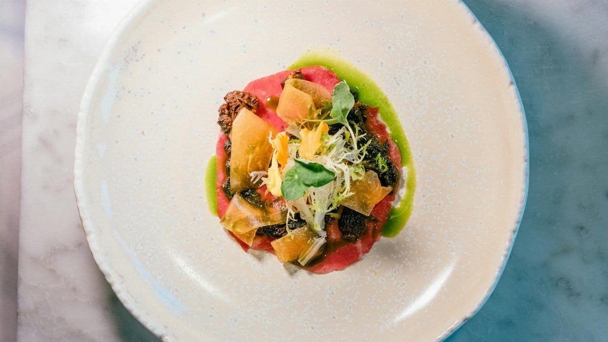 Exquisite gourmet dish on elegant plate showcasing fine dining artistry.