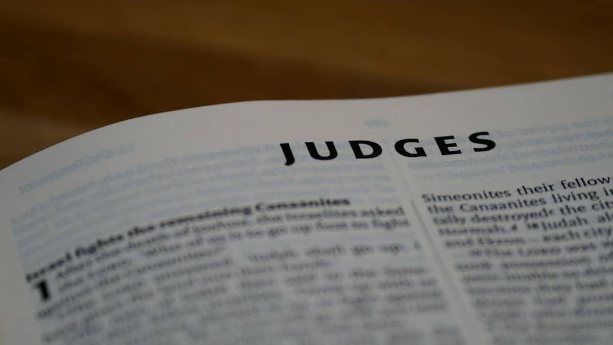 Intimate view of the Book of Judges, highlighting scripture text.