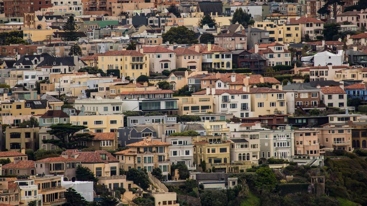 Colorful residential neighborhood in San Francisco with diverse architecture and dense housing.
