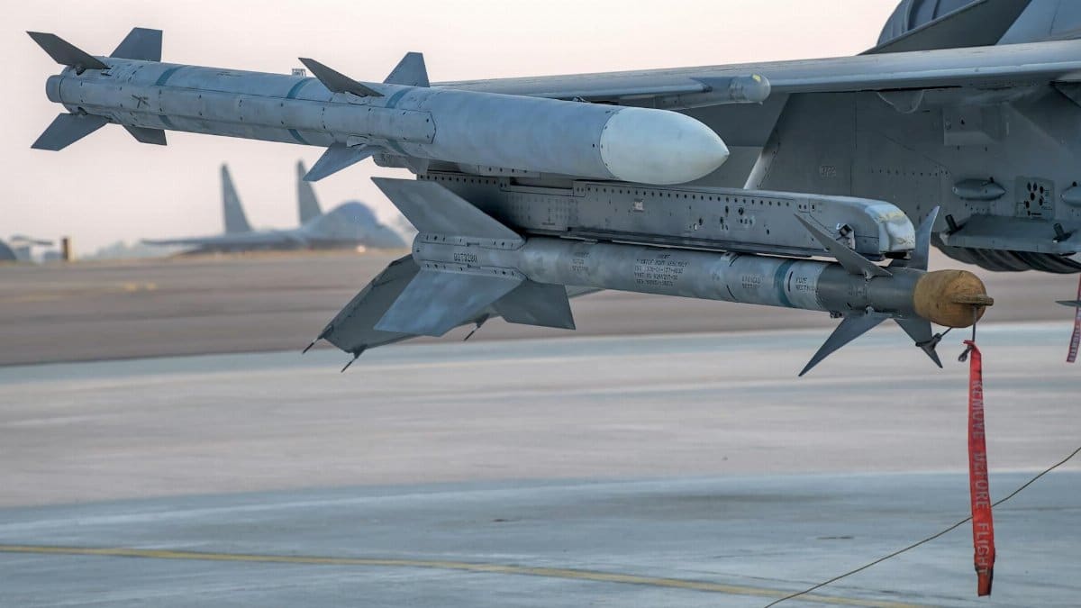 Detailed view of a military missile mounted on an aircraft wing at an airbase in Bengaluru.