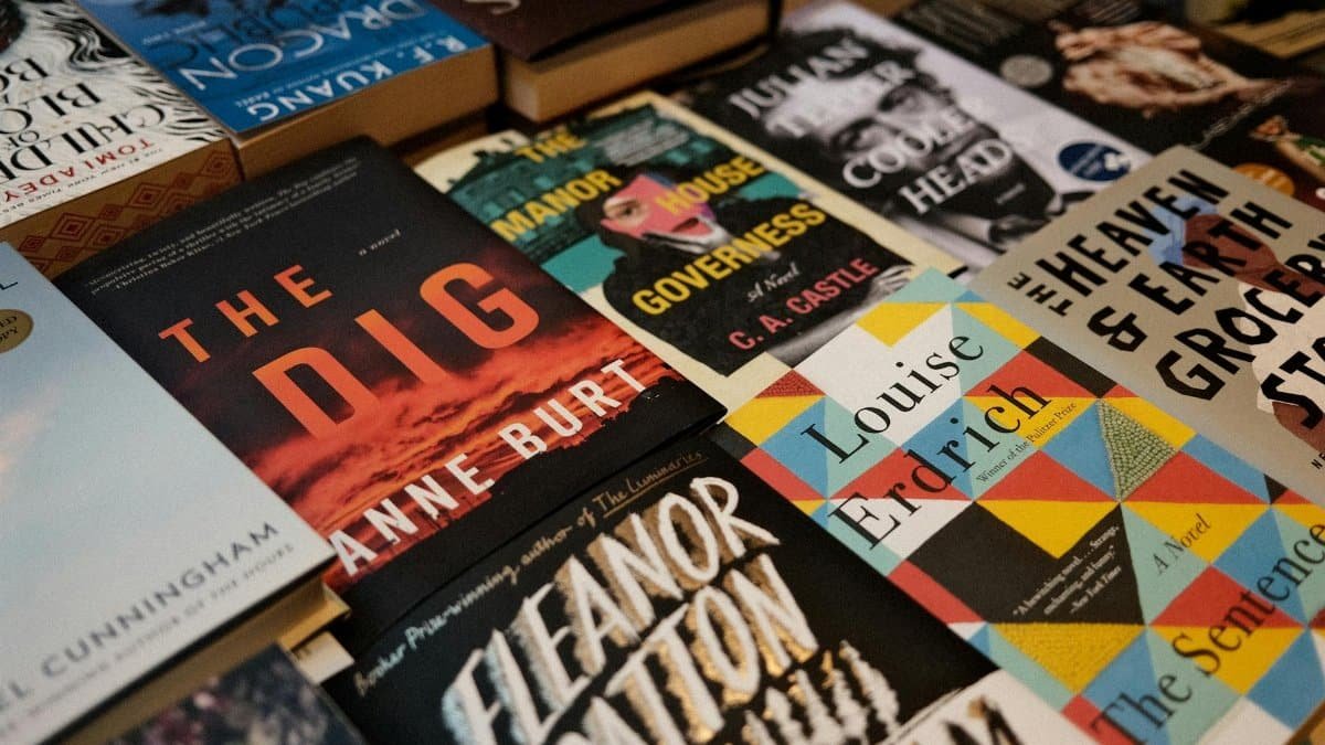 A vibrant display of various book covers in a New York City bookstore.