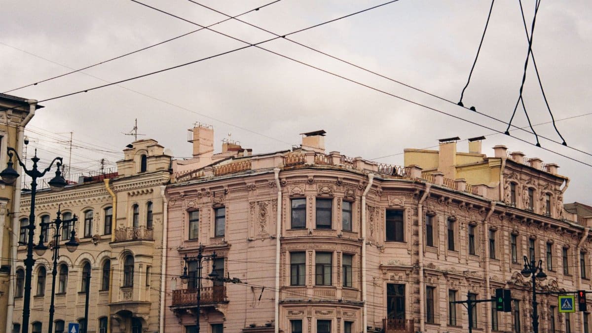 Elegant historic buildings and tram wires in Saint Petersburg, Russia.