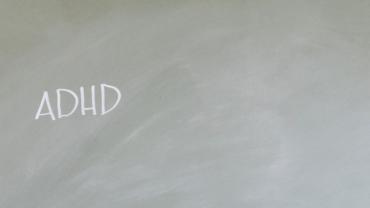 Simple depiction of ADHD awareness with text on a chalkboard.