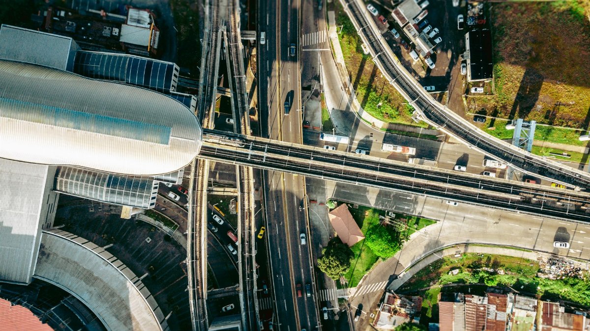 Aerial view showcasing Panama City's complex urban infrastructure with highways and buildings.