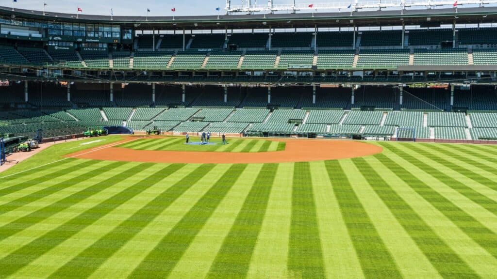 A vibrant view of Wrigley Field baseball stadium in Chicago on a sunny day.