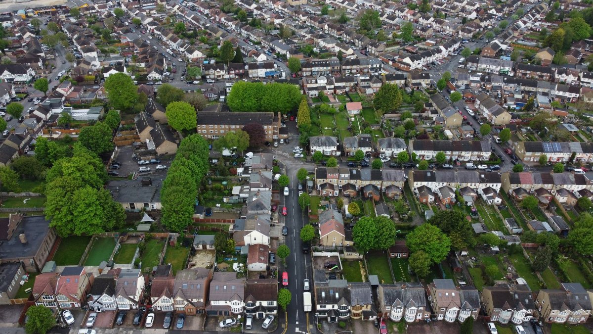 High-angle aerial view of a residential neighborhood in Luton, England showing houses and streets.