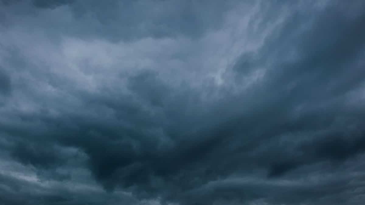 Moody and dramatic dark cloudscape capturing a stormy sky with looming clouds.