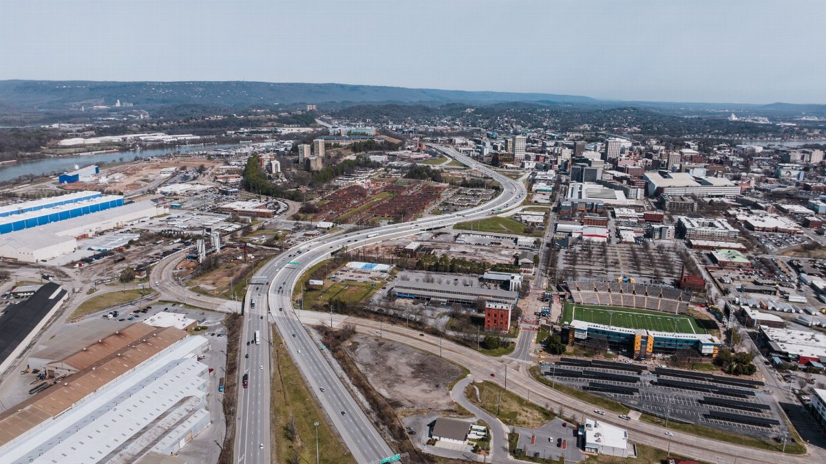 Aerial view of Chattanooga, Tennessee, showcasing highways and urban landscape.