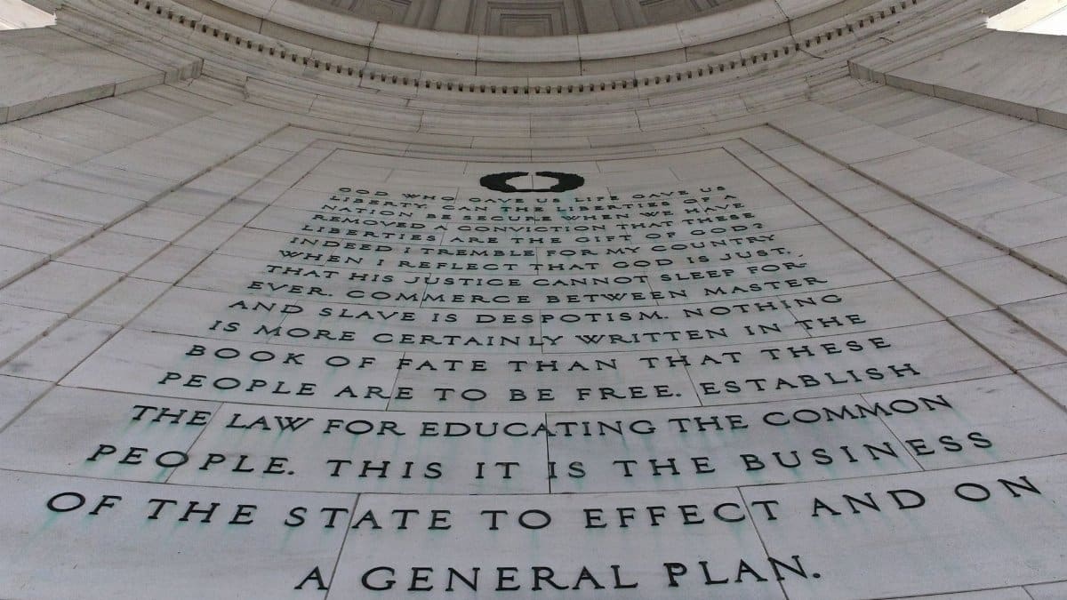 Detailed view of text inside the Thomas Jefferson Memorial, emphasizing historical significance.