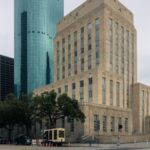 Urban view of Houston's downtown with historic and modern buildings highlighting the skyline.