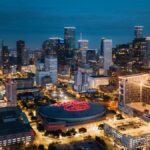 Stunning aerial panorama of Houston's illuminated skyline at night showcasing modern skyscrapers.