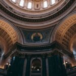 A stunning view of the intricately decorated dome inside the Wisconsin State Capitol, Madison.
