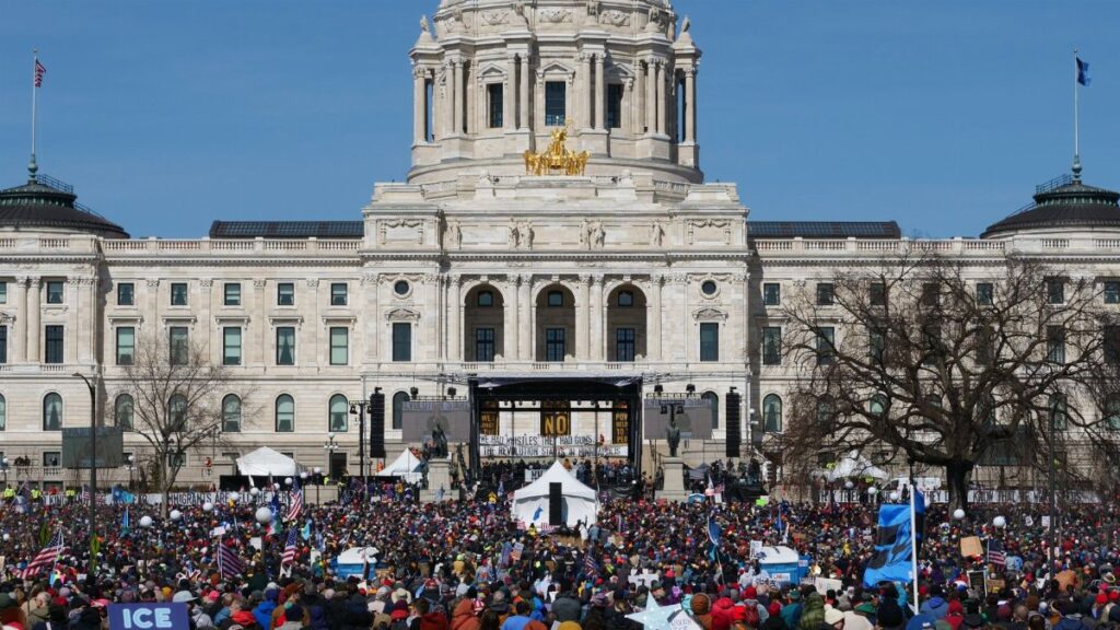Demonstrators gathered at Minnesota State Capitol advocating for change.