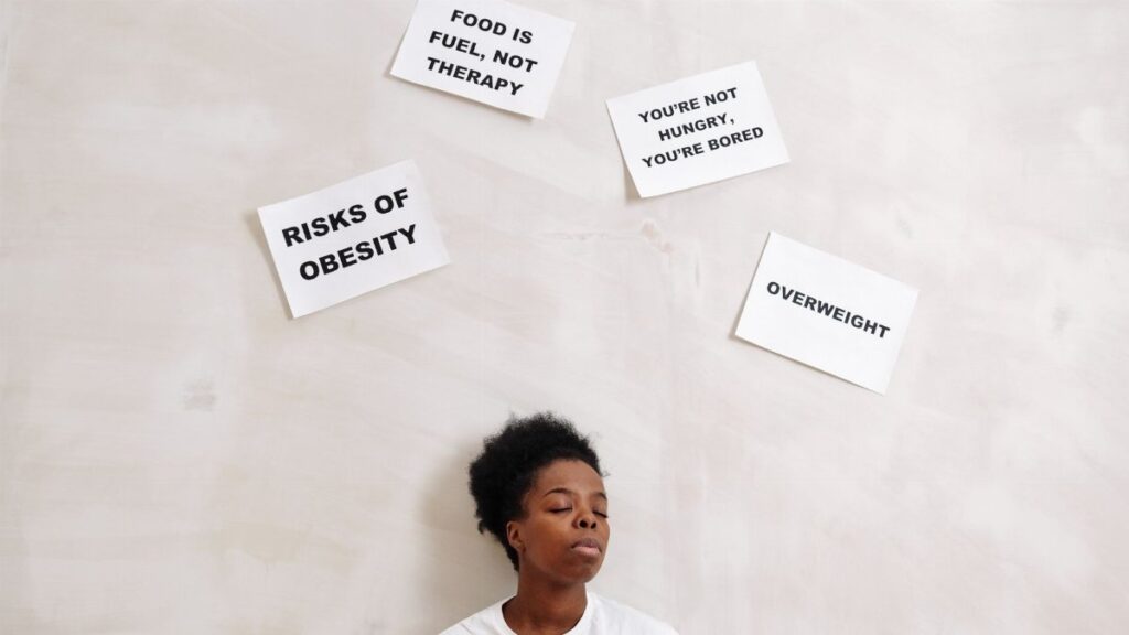 African American woman with health messages about nutrition and obesity awareness.