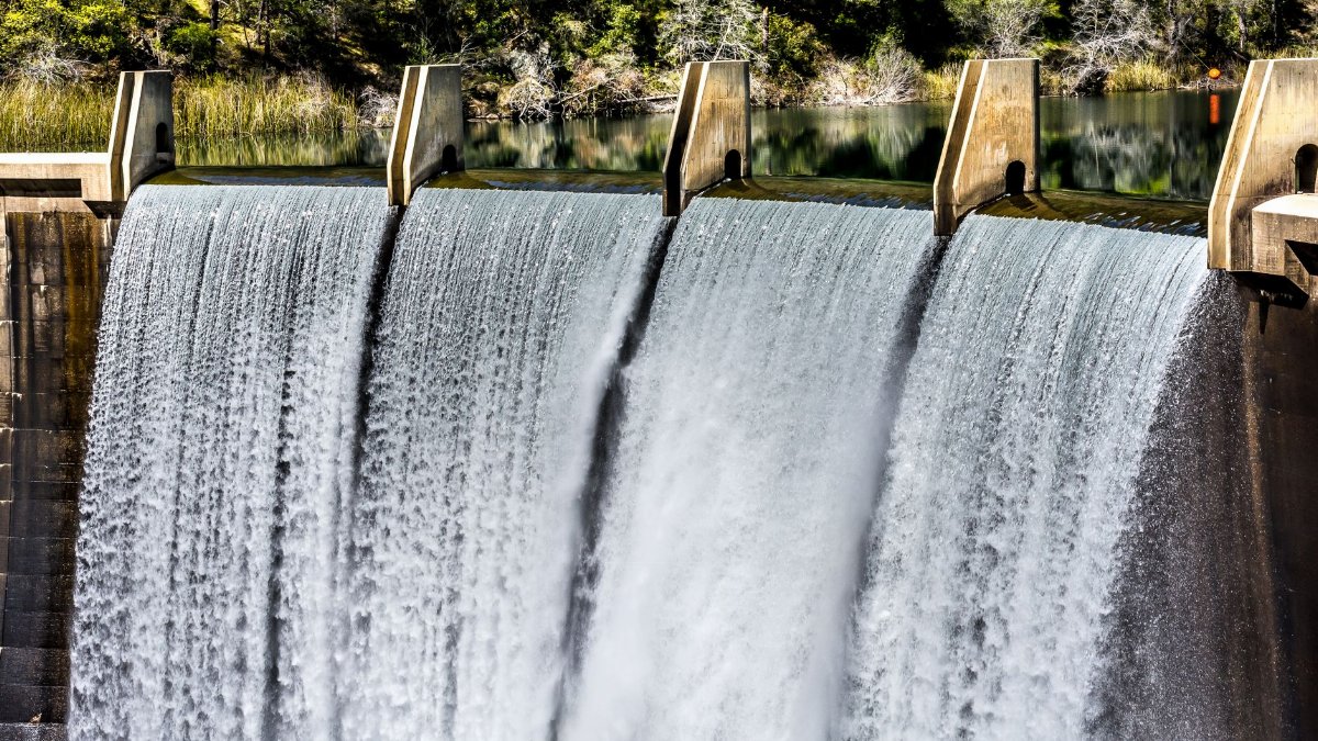 Majestic view of Lake Clementine Dam with flowing water in Auburn, California.