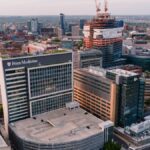 Aerial view of Penn Medicine and surrounding architecture in downtown Philadelphia during daytime.