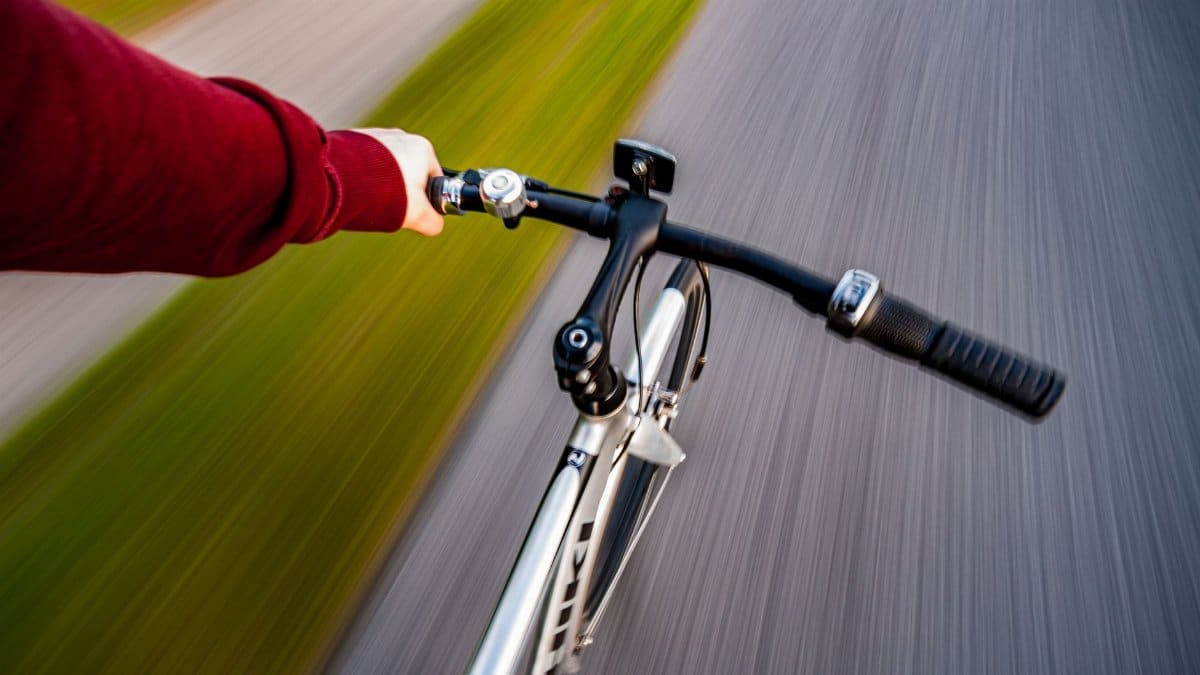 Experience the thrill of biking in Aalborg with this dynamic action shot.