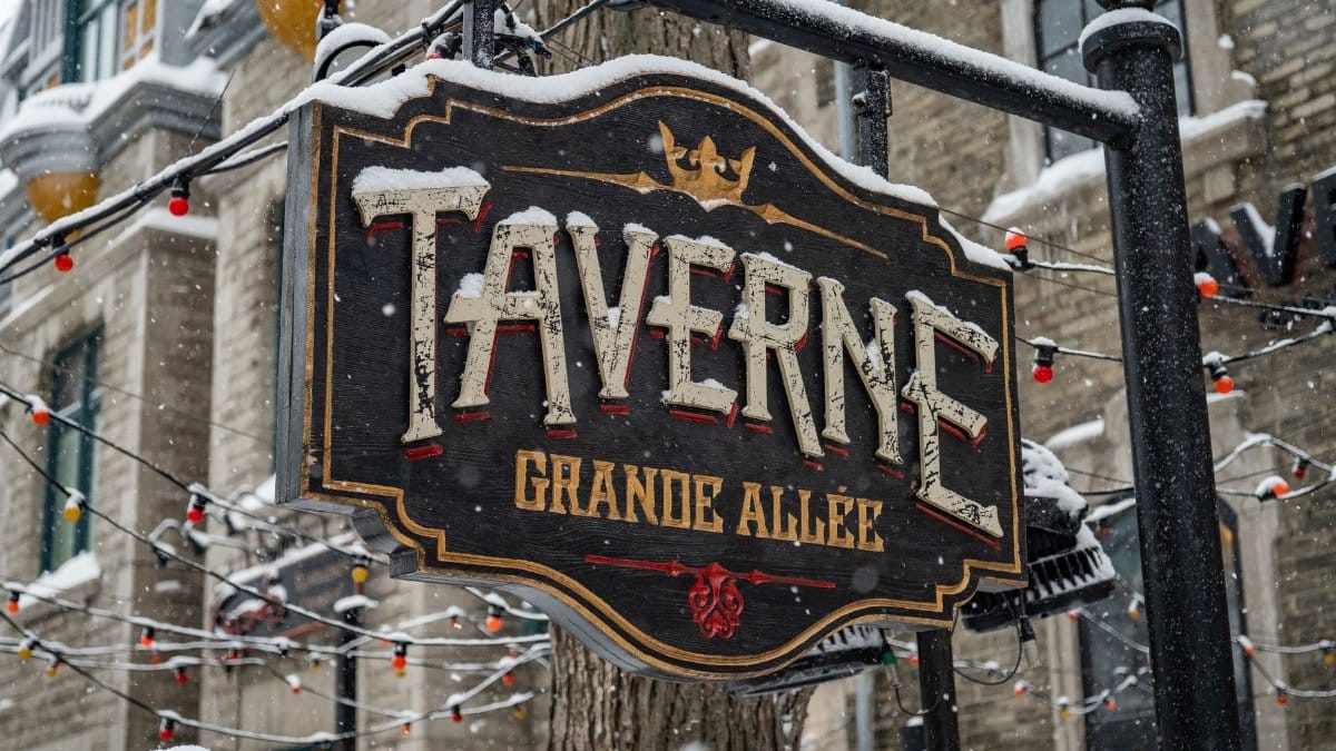 Taverne sign in snowy winter setting on Grande Allée, Quebec City.