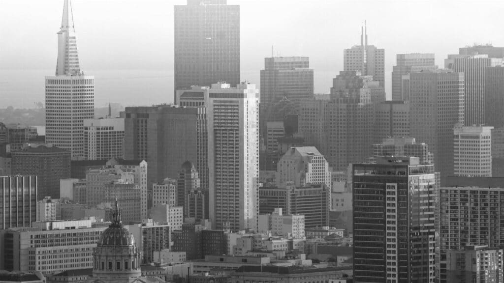 Black and white skyline of San Francisco featuring iconic skyscrapers.