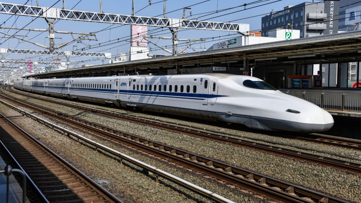 A high-speed bullet train at Hamamatsu Station in Shizuoka, Japan, showcasing modern rail transport.
