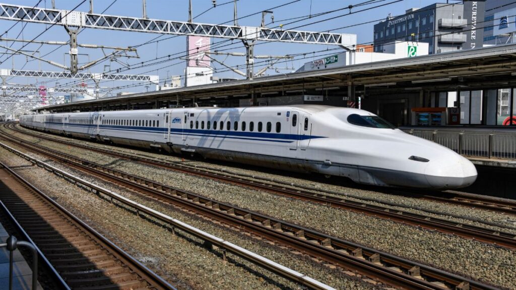 A high-speed bullet train at Hamamatsu Station in Shizuoka, Japan, showcasing modern rail transport.