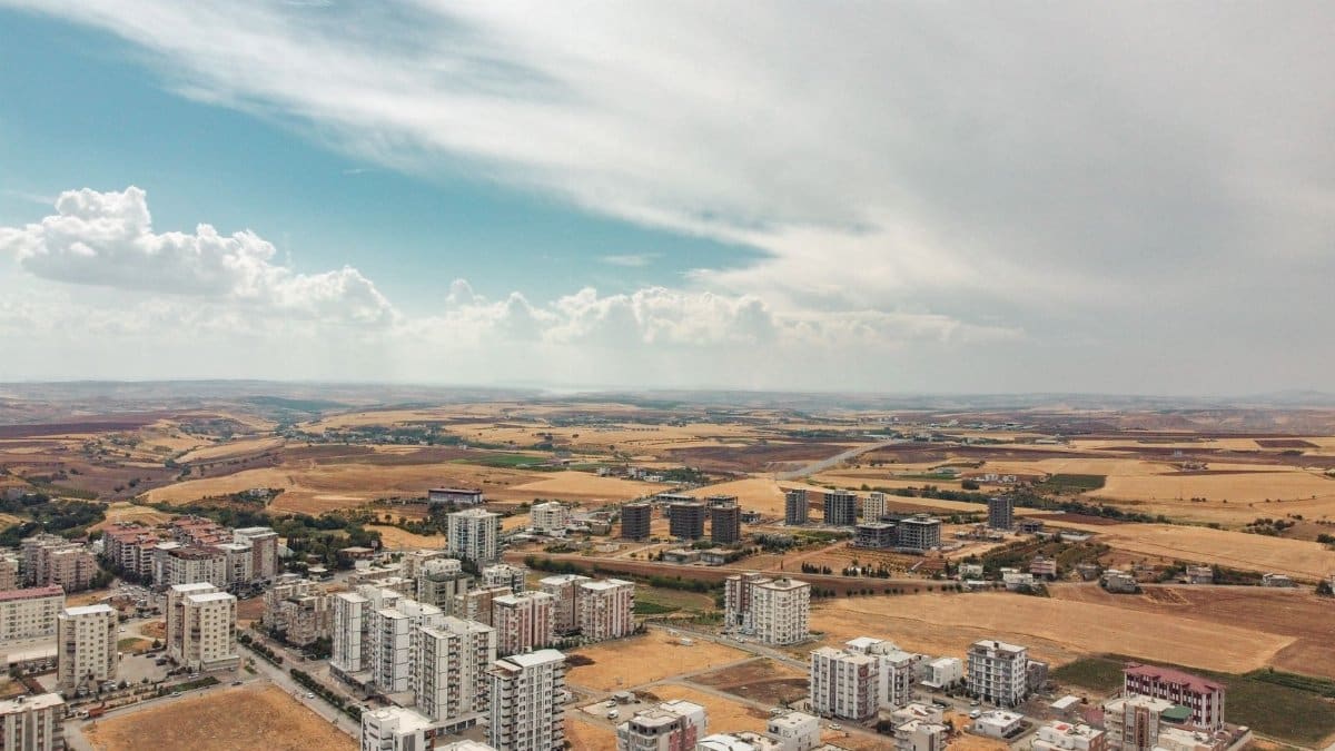 Aerial perspective of Adıyaman, Türkiye, showcasing the urban and rural landscape contrast.