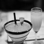 Monochrome image of cocktails on a table in Tampa, Florida.