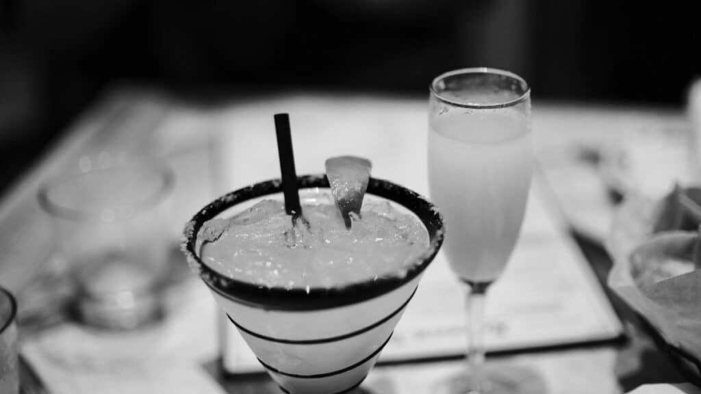 Monochrome image of cocktails on a table in Tampa, Florida.