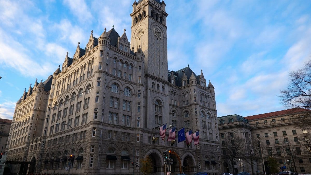 The Old Post Office Building in Washington DC under a clear blue sky.