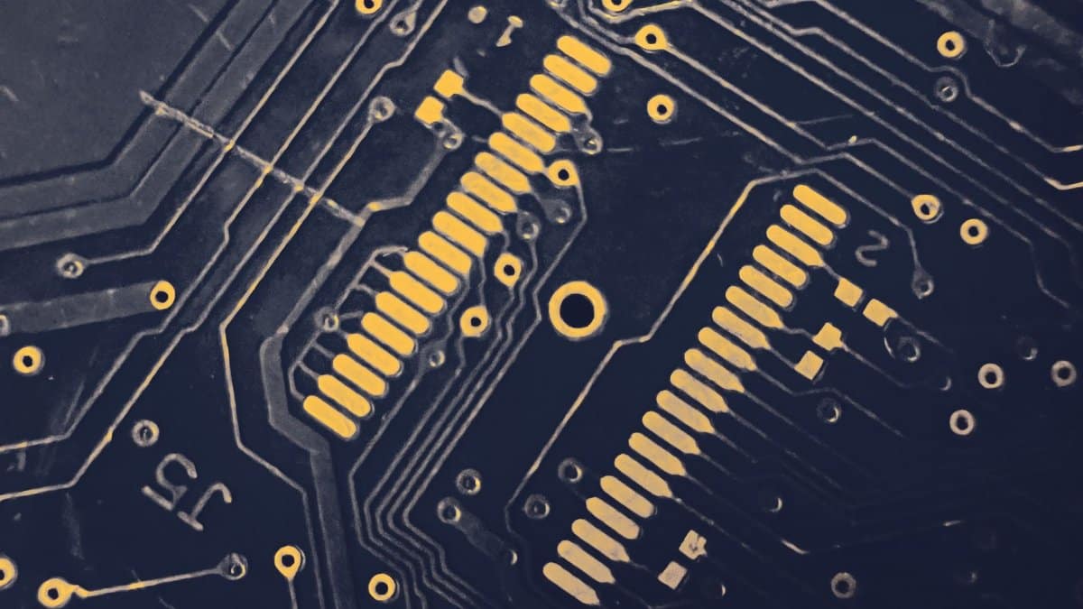 Detailed view of a modern electronic circuit board showing intricate pathways and components.