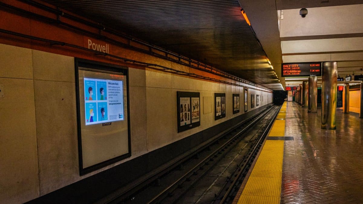 Empty subway platform at Powell Street BART Station in San Francisco.
