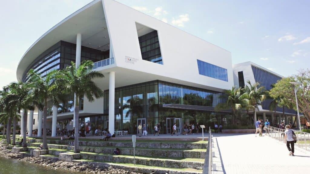 Contemporary architecture at the University of Miami campus with vibrant student life and lush surroundings.