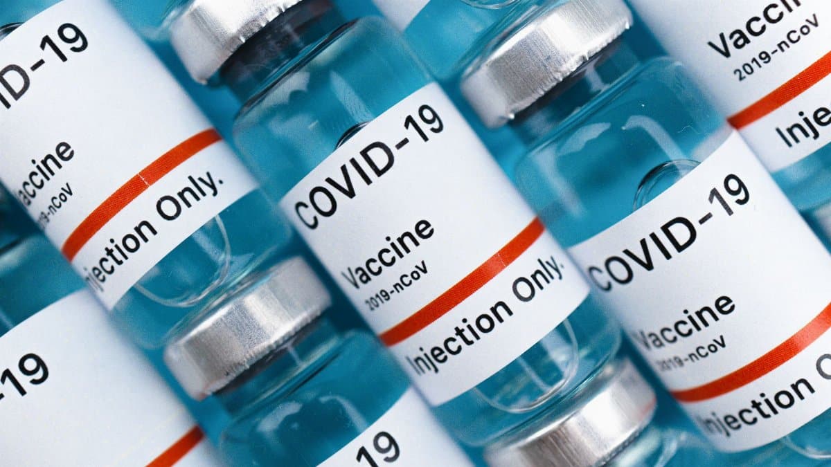 Close-up image of COVID-19 vaccine vials, highlighting pharmaceutical concepts.