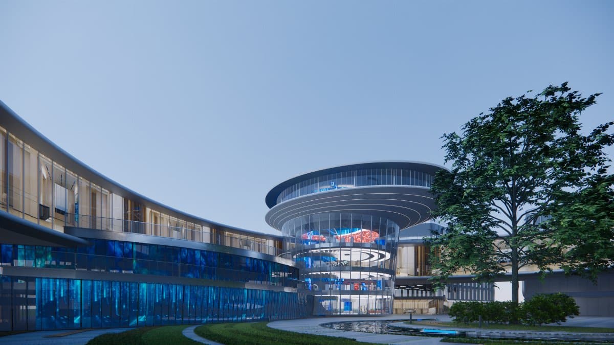 Modern architectural design featuring a circular building with glass facade and vibrant colors.