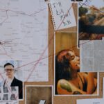 A detailed crime investigation board with photos, maps, and red threads used for connecting clues.
