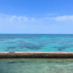 Tranquil turquoise ocean and sky at Key West, Florida. Perfect for relaxation and travel inspiration.