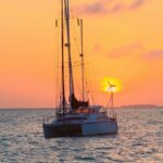 Peaceful sunset scene of sailboats in Key West waters, Florida.