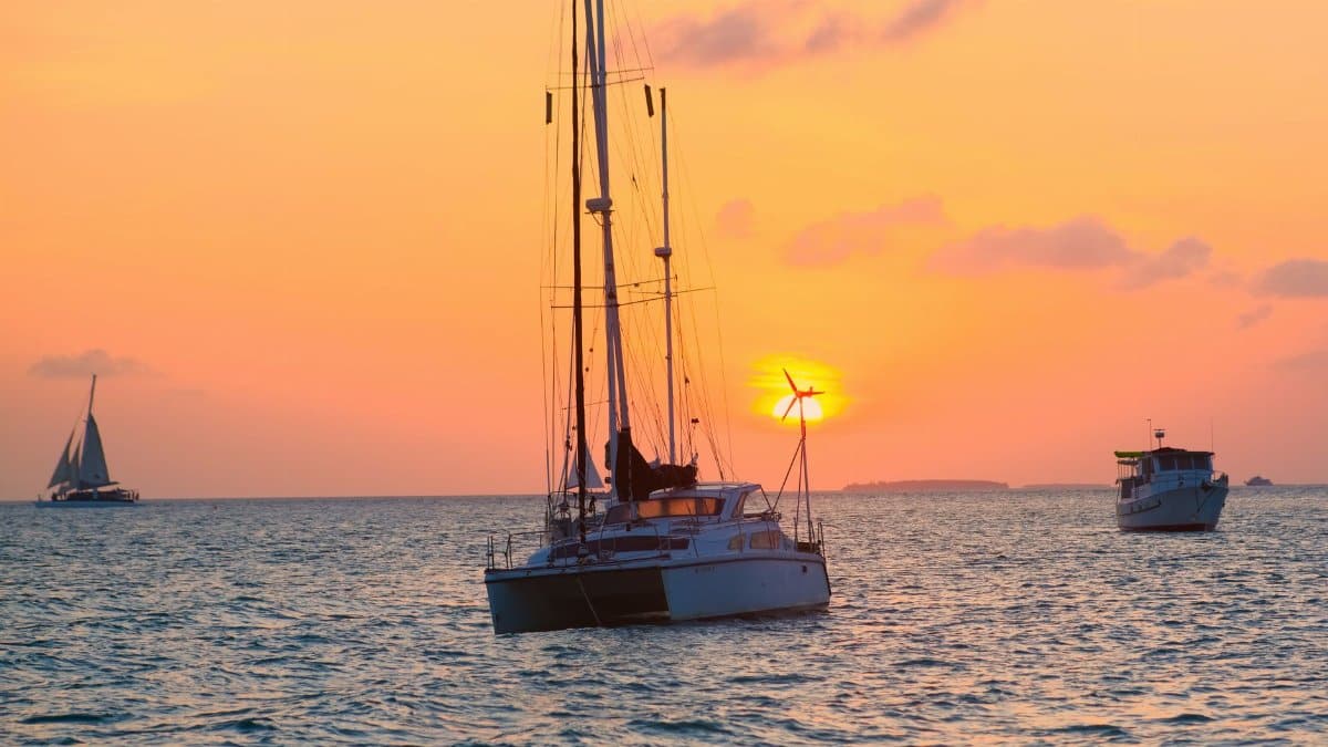 Peaceful sunset scene of sailboats in Key West waters, Florida.
