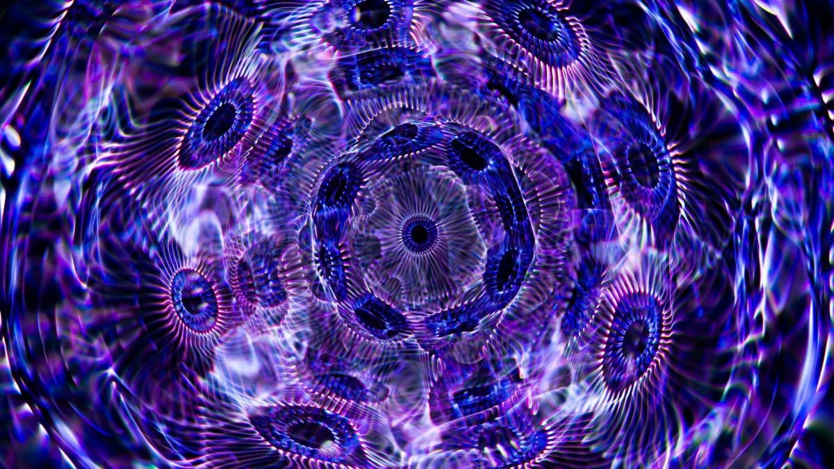 A dynamic, colorful abstract pattern with geometric and kaleidoscope effects in vibrant purples and blues.