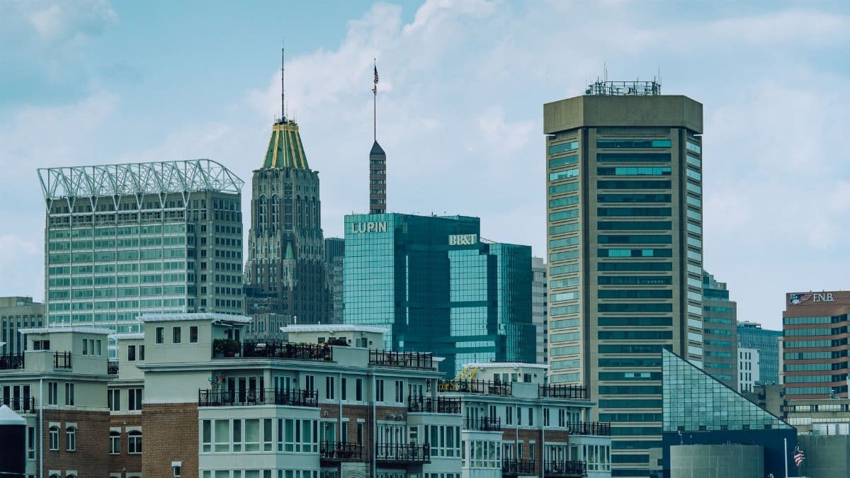 A vibrant view of Baltimore cityscape featuring iconic skyscrapers under a clear sky.