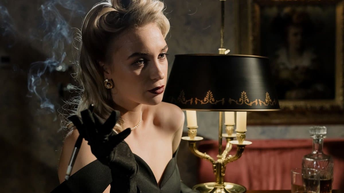 Elegant woman in vintage noir setting, smoking with alluring expression, glamorous style.